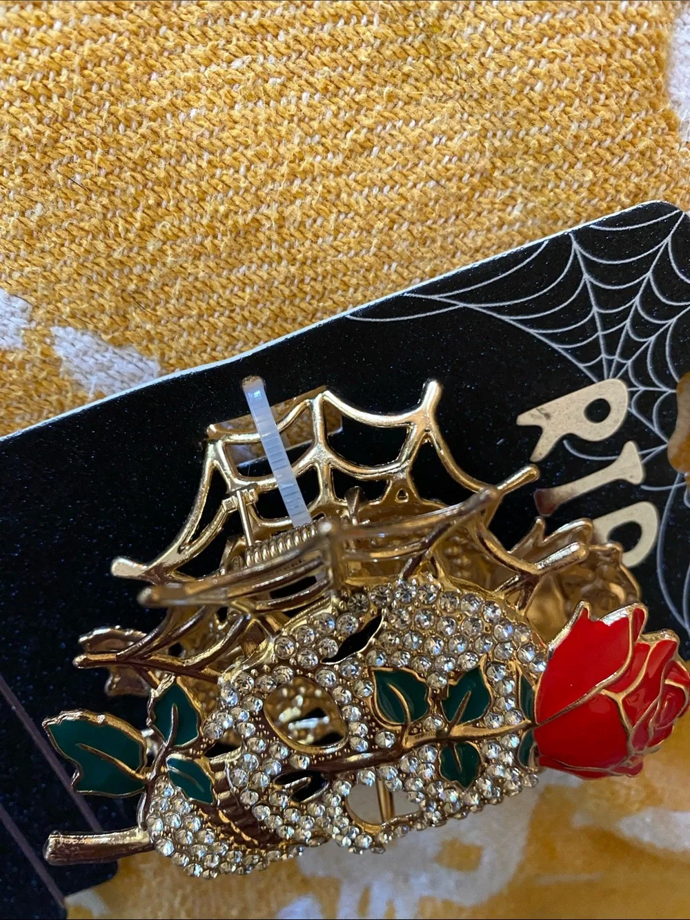 Nicole Miller Gold-Tone Crystal Skull Hair Pin with Red Rose and Green Leaves
